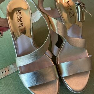 Mever worn Michael Kors wedge shoes.